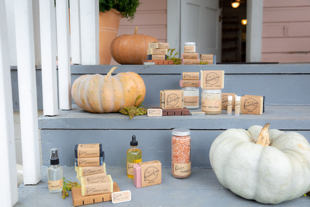 freedom soaps fall product photography - all products and pumpkins on porch.jpg