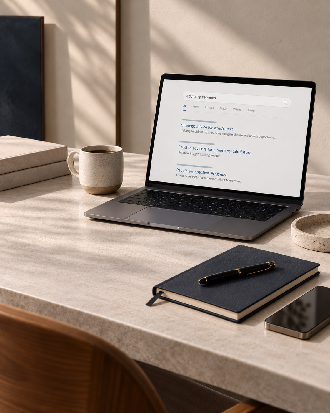 computer showing search results sitting on a clean desk
